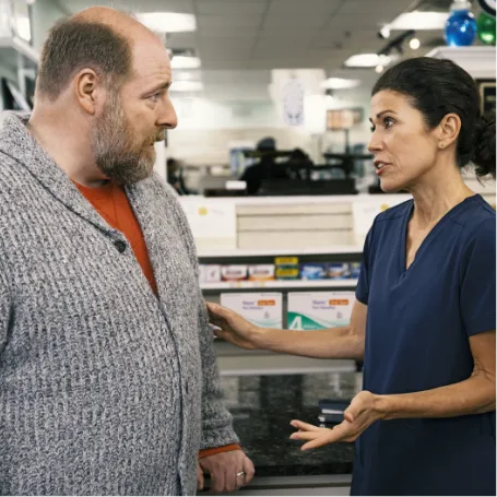 A doctor talking to her patient about the embecta diabetes guide